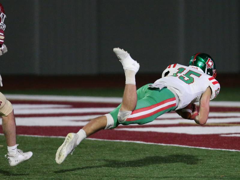 L-P's Brendan Boudreau (15) dives for the touchdown against Morris during last season's playoffs.