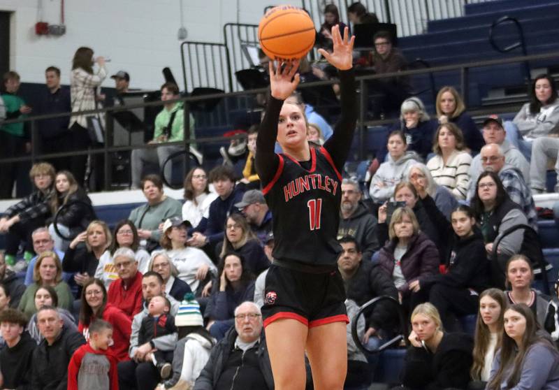Huntley’s Anna Campanelli takes an outside shot in varsity girls basketball on Friday, Jan. 24, 2025, at Cary-Grove High School in Cary.
