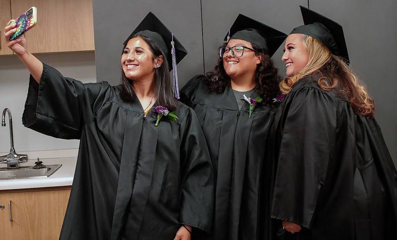 These 2024 graduates make memories as they prepare for IVCC's annual Adult Education Recognition event. This year's 44th annual recognition on Wednesday, May 21, honors students who have completed GEDs, citizenship studies or career pathway programs. Three of the completers will be keynote speakers for the event.