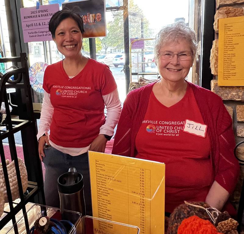 Diane Stablein, left, and Jill Mickelson are among the members of the Yorkville Congregational Church helping set up for the spring rummage and bake sale April 11 and 12.