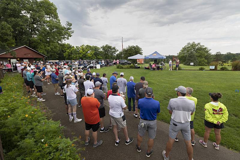 Golfers line up for the start of the YSJ golf outing July 14, 2024 at Lost Nation Golf Club. The outing raises money for Jessie’s Mile and St. Jude.