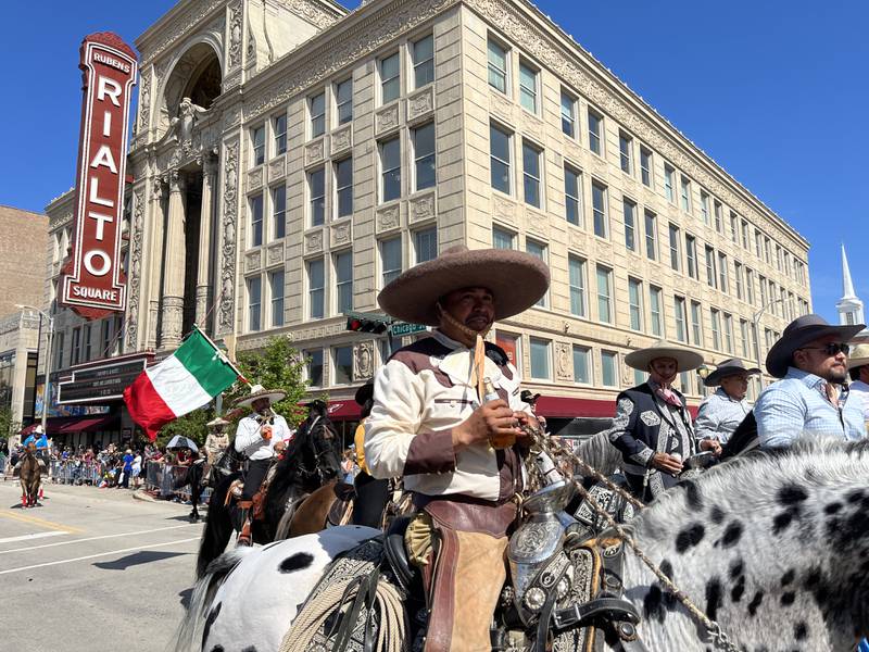 Horse riders traveling down Chicago Street for the 60th annual Mexican Independence Day parade on Saturday, Sept. 23, 2023, in downtown Joliet.