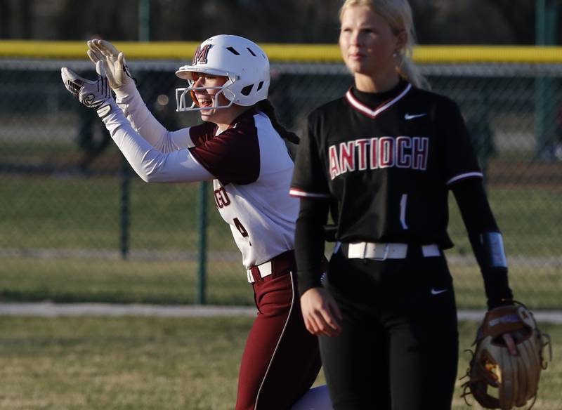 Marengo's Josephine Christiansen celebrates her home run during a nonconference softball game against Antioch on Monday, March 31, 2025, at Marengo High School.