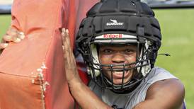 Photos: Dixon football takes the field