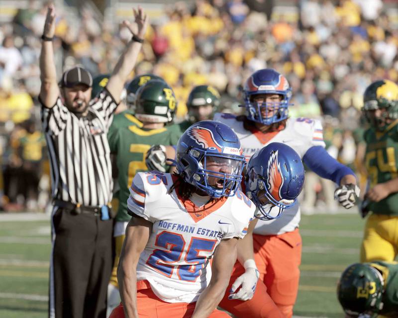 Hoffman Estates’ Dimarte Neustader, 25, celebrates a touchdown Saturday October 29, 2022 in Elk Grove Village.