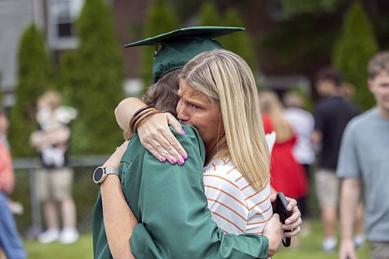 Erica Wiersema hugs son Kade Boostrom Sunday, May 28, 2023 after Rock Falls High School’s 144th commencement ceremony.