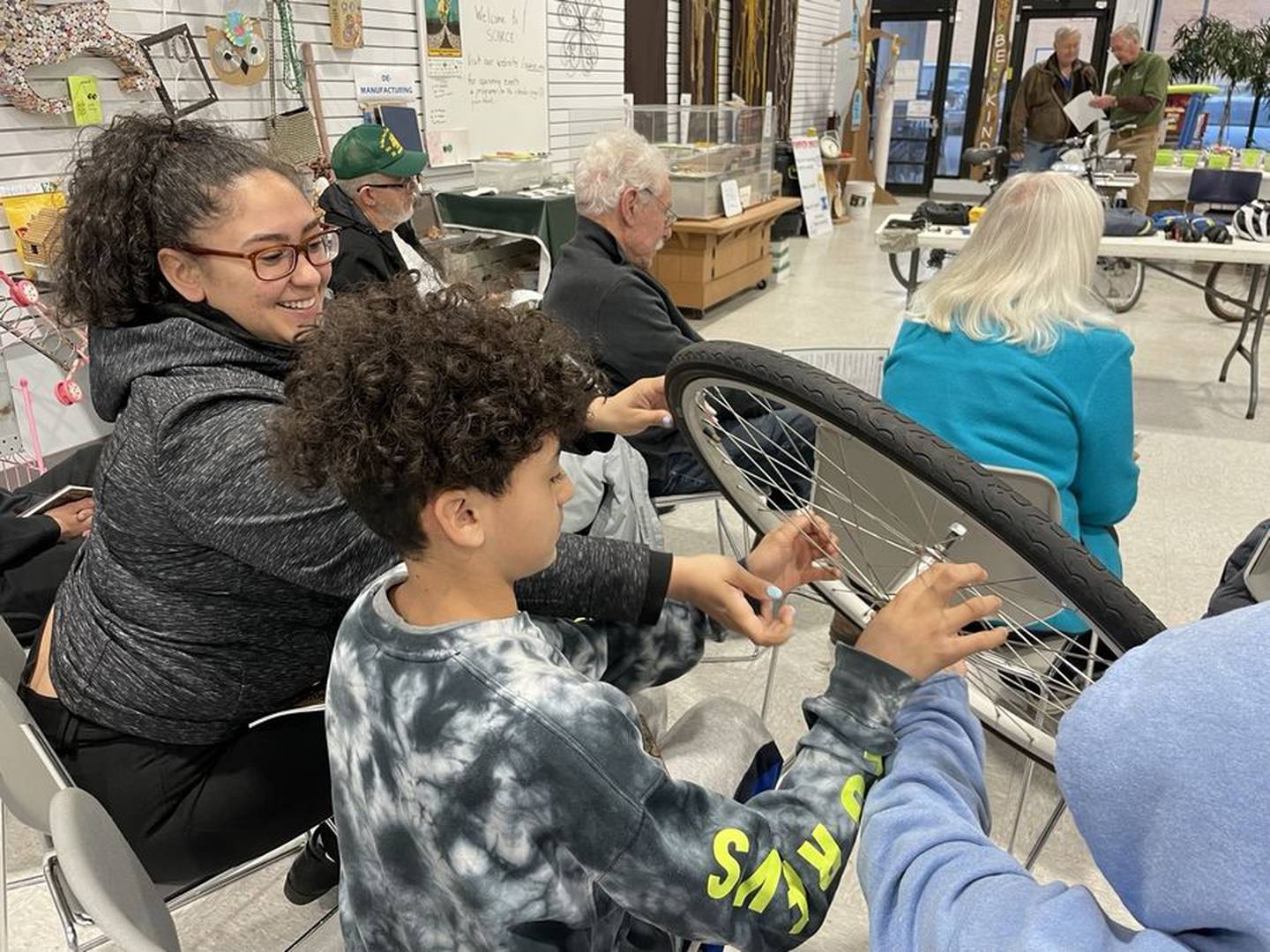 SCARCE's bike repair workshop, which covered simpler repairs people can make on their own as well as what tools to bring with them on a bike ride, was presented by Working Bikes, a nonprofit bike repair shop based in Chicago. (Photo courtesy of SCARE)