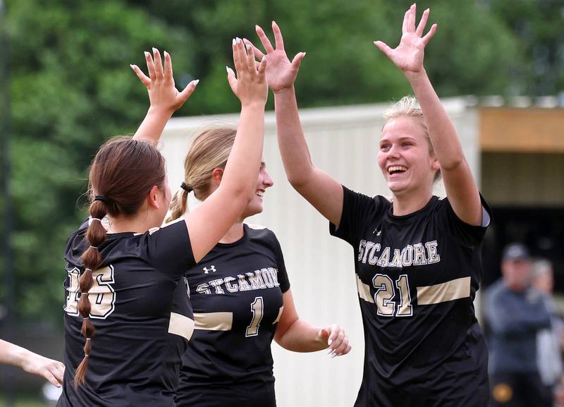 Sycamore's Charlotte Yates (left) celebrates after scoring a goal against Rock Island with teammate Kelsie Ryder Friday, May 22, 2026, during their Class 2A regional championship matchup at Sycamore High School.