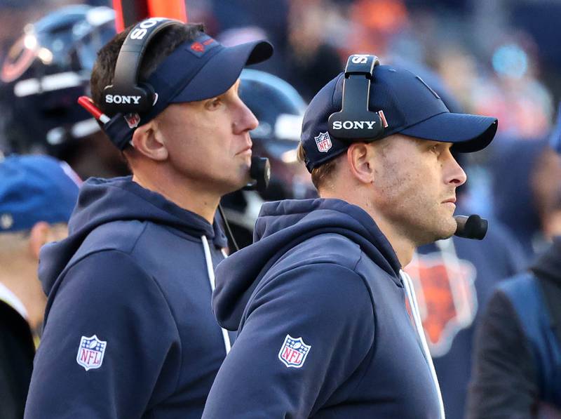 Chicago Bears head coach Ben Johnson (right) and defensive coordinator Dennis Allen watch their defense try to make a stop Sunday, Nov. 23, 2025, during their game against the Pittsburgh Steelers at Soldier Field in Chicago.