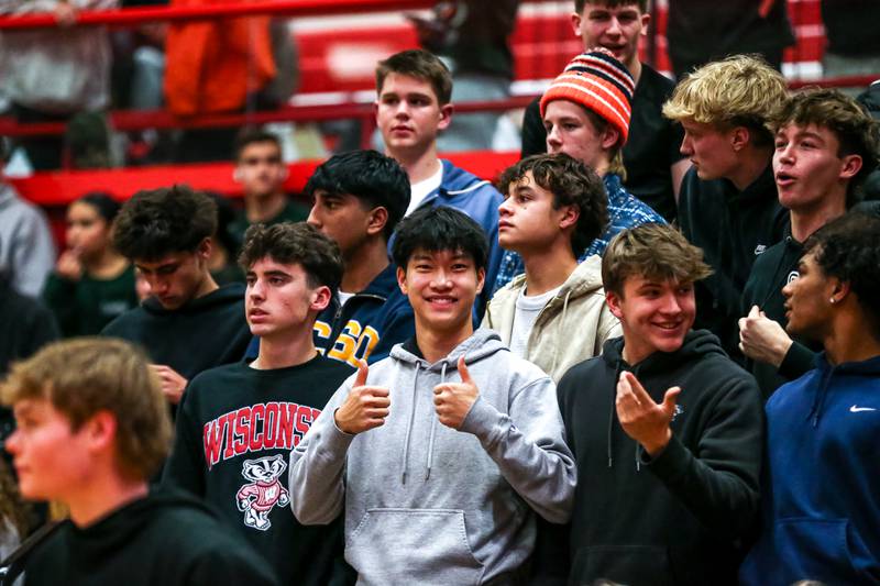 The Glenbard West student section during their basketball game between Glenbard West at Hinsdale Central, Friday  Dec 6, 2024  in Hinsdale.