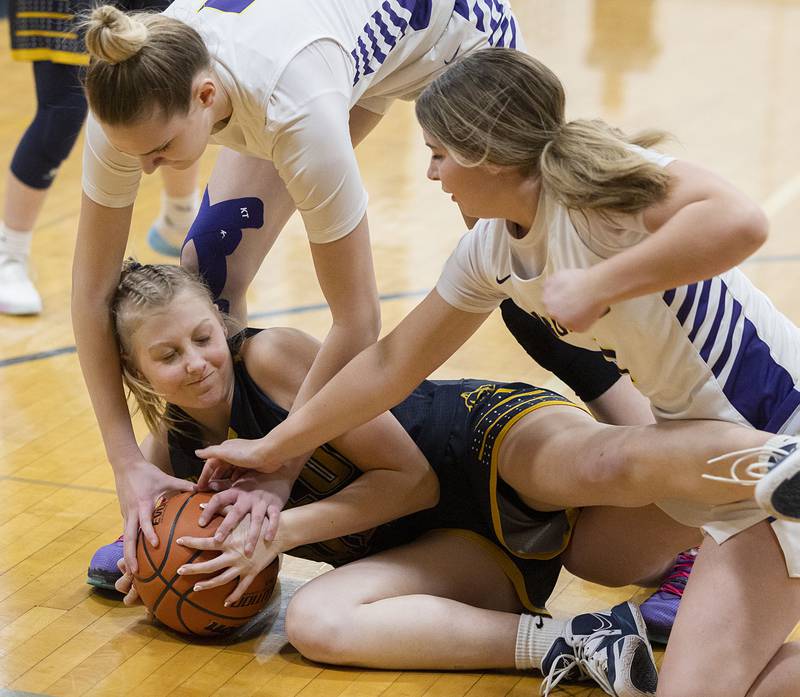 Polo’s Sydney Rahn grabs a loose ball Tuesday, Feb. 21, 2023 in the sectional semifinal against Orangeville.