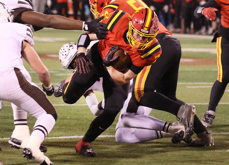 Batavia's Greyson Kelly gets through the Mt. Carmel line for a touchdown during their Class 8A state championship game Saturday, Nov. 30, 2024, in Hancock Stadium at Illinois State University in Normal.