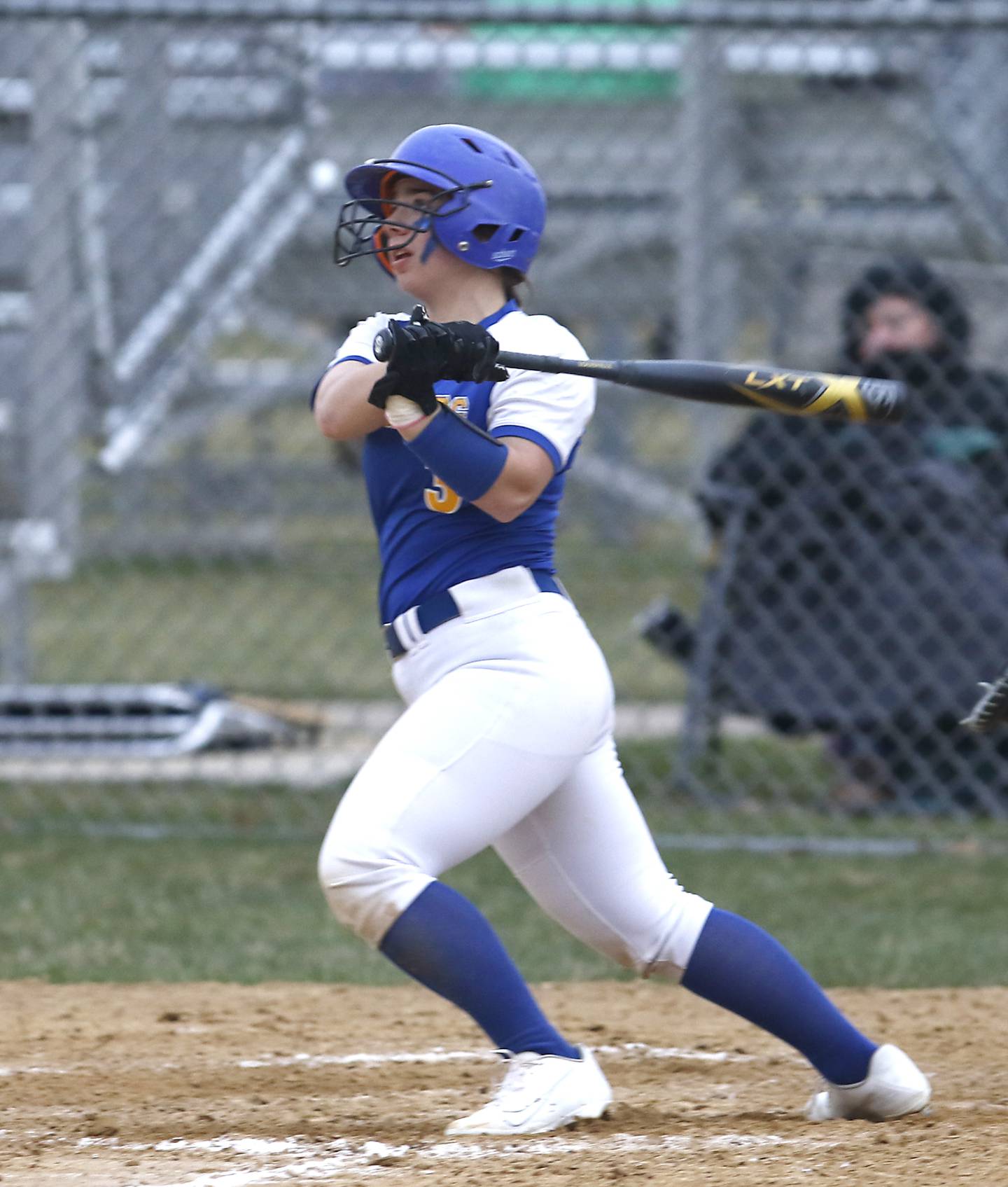 Johnsburg’s Brooke Klosowicz watches her home run fly during a Kishwaukee River Conference softball game Tuesday, April 12, 2022, between Marengo and Johnsburg at Hiller Park in Johnsburg.