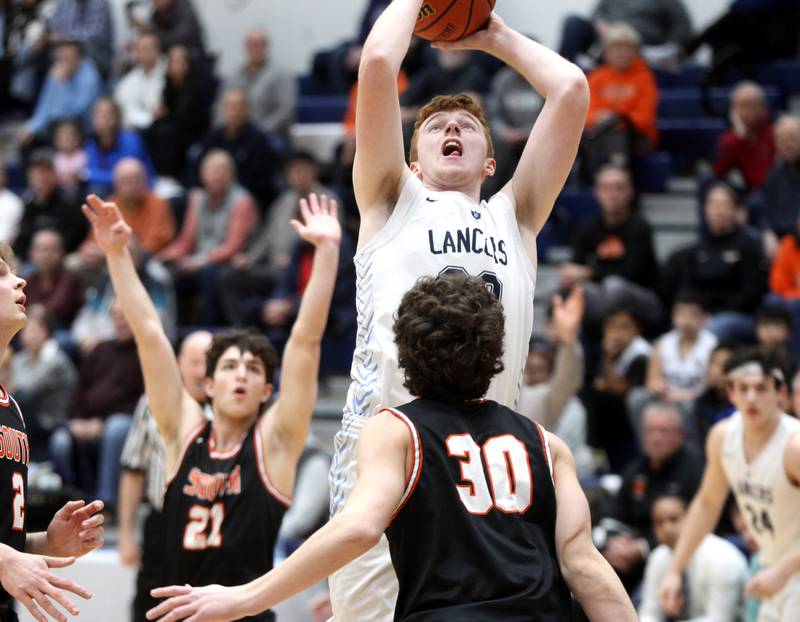 Lake Park’s Tommy Rochford shoots the ball during a game against Wheaton Warrenville South at Lake Park in Roselle on Friday, Feb. 10, 2023.