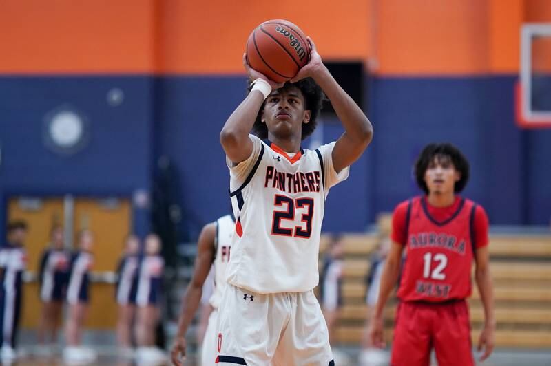 Oswego’s Dasean Patton (23) shoots a free throw against West Aurora during a basketball game at Oswego High School on Friday, Dec 1, 2023.