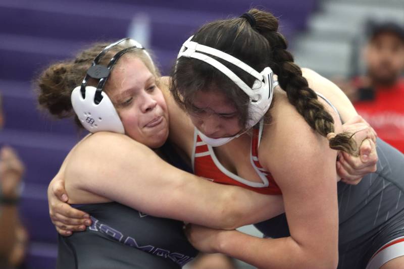 Hampshire’s Samantha Diehl, left, battles Palatine’s Irma Villa at 190 pounds in varsity girls IHSA Regional Championship wrestling action on Saturday, February 7, 2026, at Hampshire High School in Hampshire.