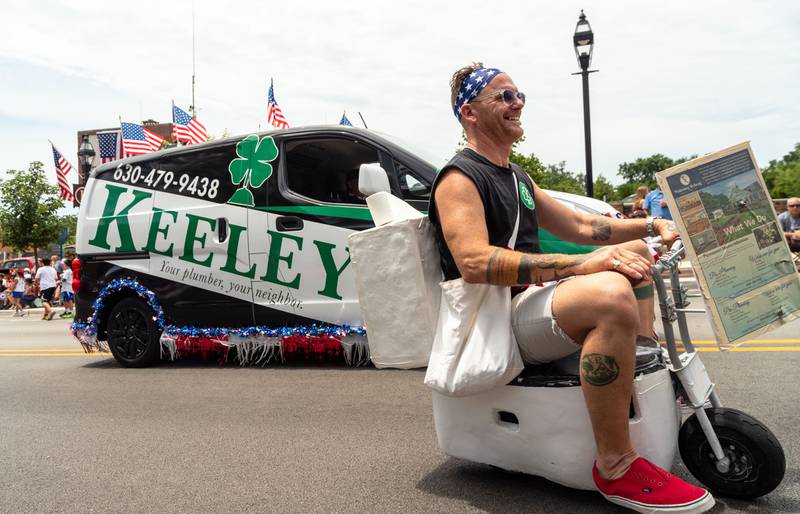 Keeley’s Plumbing processes up Main Street in Glen Ellyn during Glen Ellyn’s “4th of July Parade” on Friday, July 4, 2025.