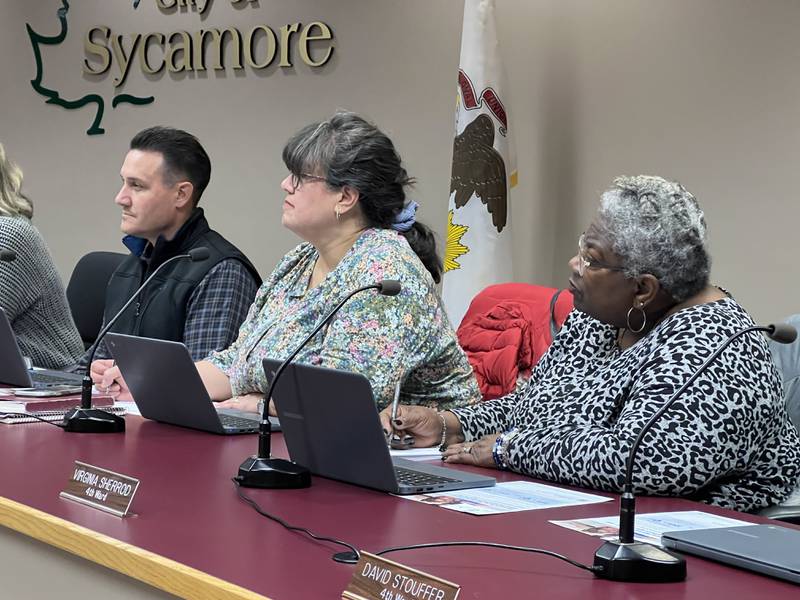 Members of Sycamore City Council listen to a speaker giving a presentation during Monday night's Sycamore City Council meeting on Dec. 5, 2022. From left to right: Third Ward Ald. Jeff Fischer, Third Ward Ald. Nancy Copple and Fourth Ward Ald. Virginia Sherrod.