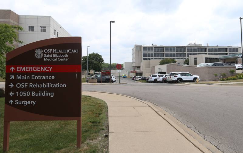 A sign points to the Emergency enterance at Saint Elizabeth Medical Center on Tuesday, June 13, 2023 in Ottawa. This is what St. Elizabeth's Emergency Room road to their ER looks like. It is located on the far west side of the building.