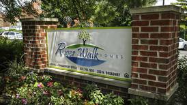 Joliet police officer almost struck by scissors at Riverwalk Homes, other officers finds gun