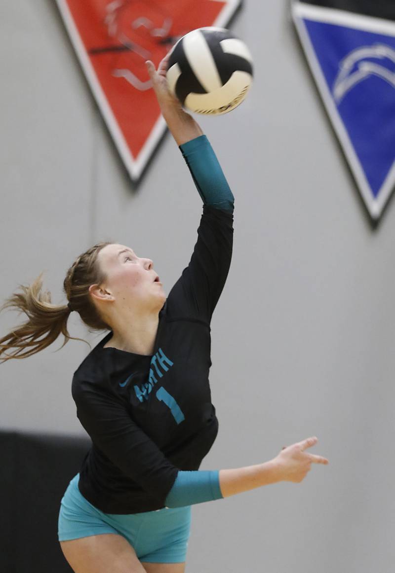 Woodstock North's Tayler Menzel serves the ball during a Kishwaukee River Conference volleyball match against Richmond-Burton on Monday, Sept. 15, 2025, at the Woodstock North High School.