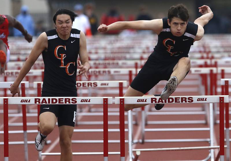 Crystal Lake’s Gavin Wang, right, and Jonathan Tegel compete in the 110 meter hurdles during the IHSA Class 3A Huntley Boys Track and Field Sectional Wednesday, May 18, 2022, at Huntley High School.