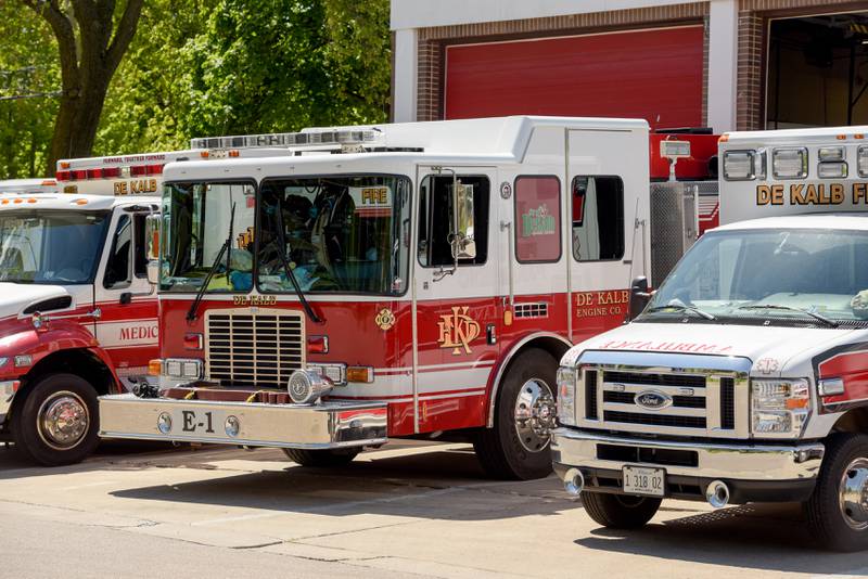 DeKalb Fire Station Number 1 with ambulance and fire trucks parked out front in DeKalb, IL