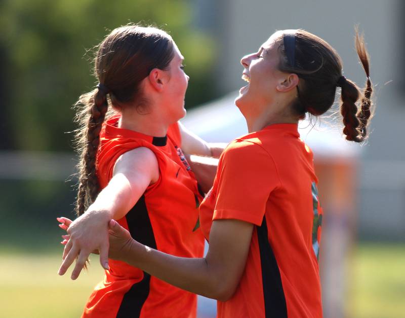Crystal Lake Central’s Ella Bechler, right, is greeted by Alex Hannell, left, after a Bechler goal against Hononegah in IHSA Class 2A Sectional Semifinal girls soccer on Monday, May 25, 2026 at Crystal Lake Central High School in Crystal Lake.