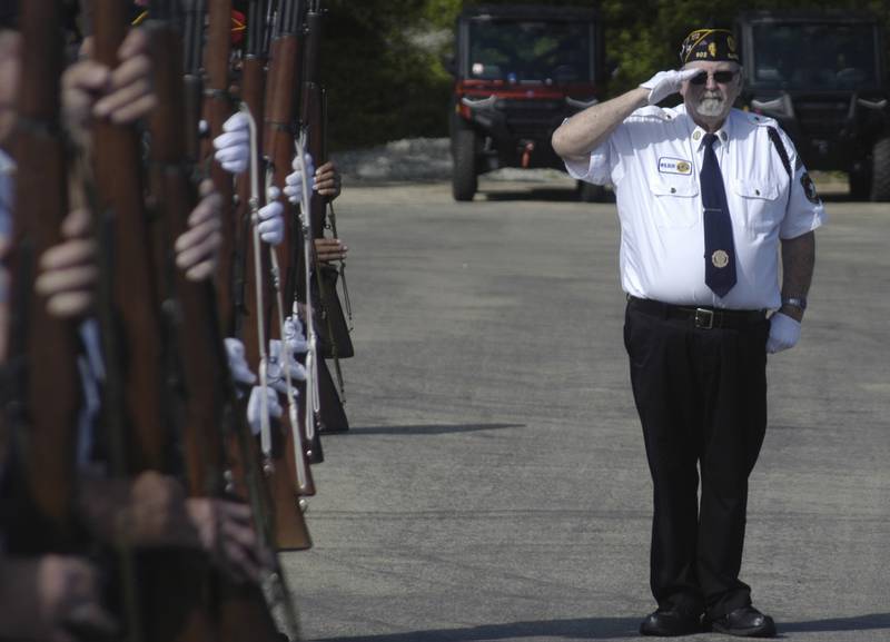 Honor Guard Captain Wilbur Wildman salutes during taps. Twin City American Legion's marked Memorial Day with various events on Monday, May 25, 2026.