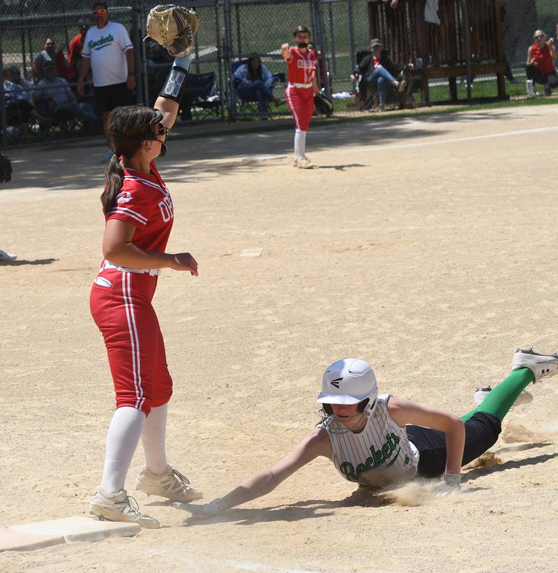 Oregon first baseman Brooke Halverson catches a throw from Ashlee Mundell to double up Rock Falls' Rylee McFadden during the championship game at  the 2A Oregon Regional on Saturday, May 23, 2026 at Oregon Park West.