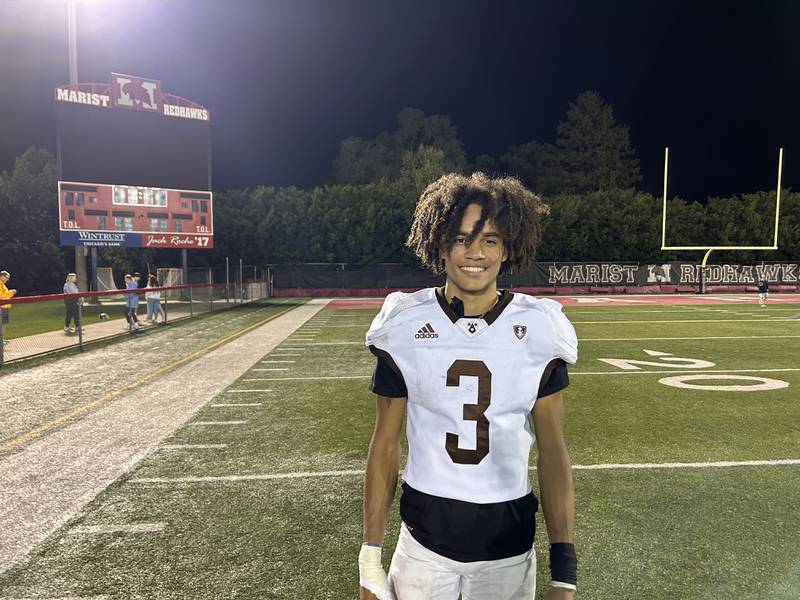 Joliet Catholic wide receiver Adrian Washington caught three touchdowns to lead the Hilltoppers past Marist 21-20 on Friday in Chicago.