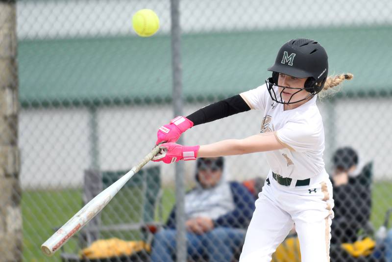 Bishop McNamara's Maddy Weiland hits a pitch during a home game against St. Laurence Saturday, April 11, 2026.