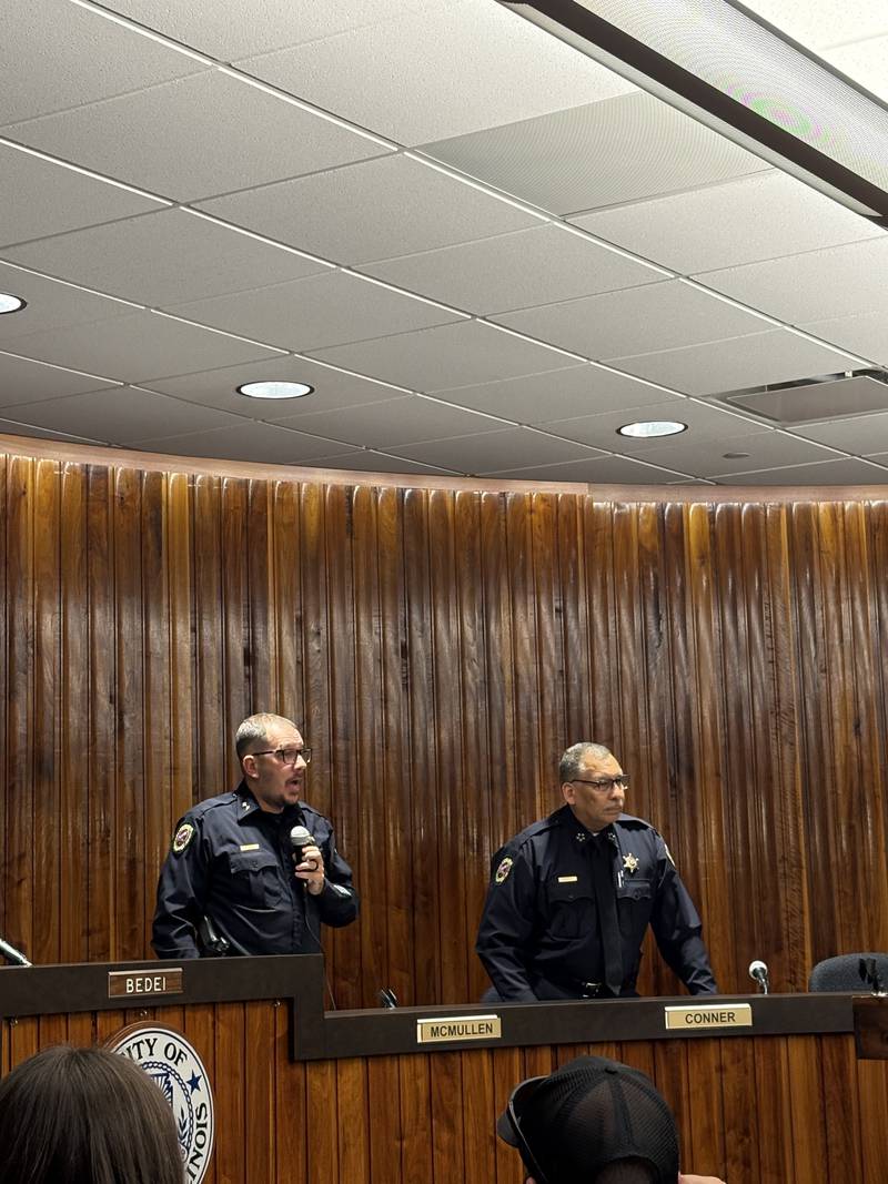 Deputy Police Chief Robert Wood (left) speaks Tuesday, Oct. 15, 2024, as Police Chief John Franklin looks on at a special Streator meeting.
