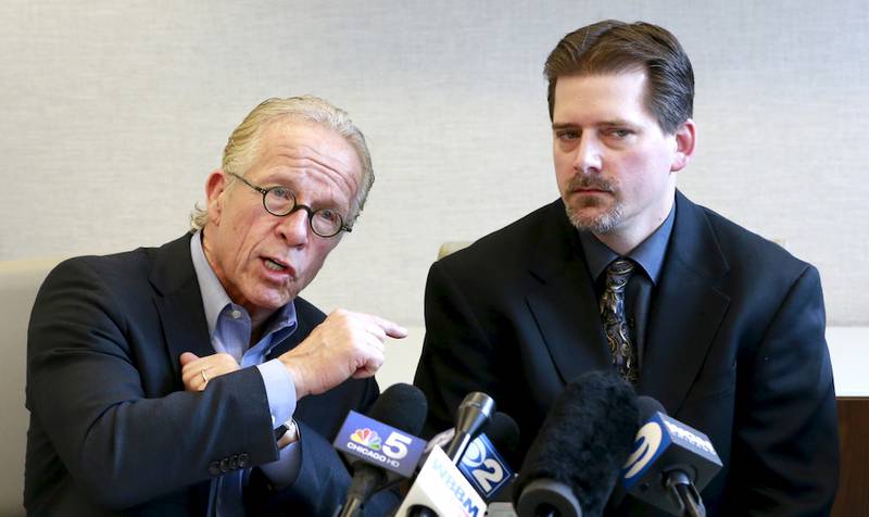 Attorney Jeff Anderson (left) responds to a question on the release of sex abuse documents from the Diocese of Joliet, during a news conference Wednesday, April 30, 2014, in Chicago with priest sex abuse victim Dave Rudofsky.