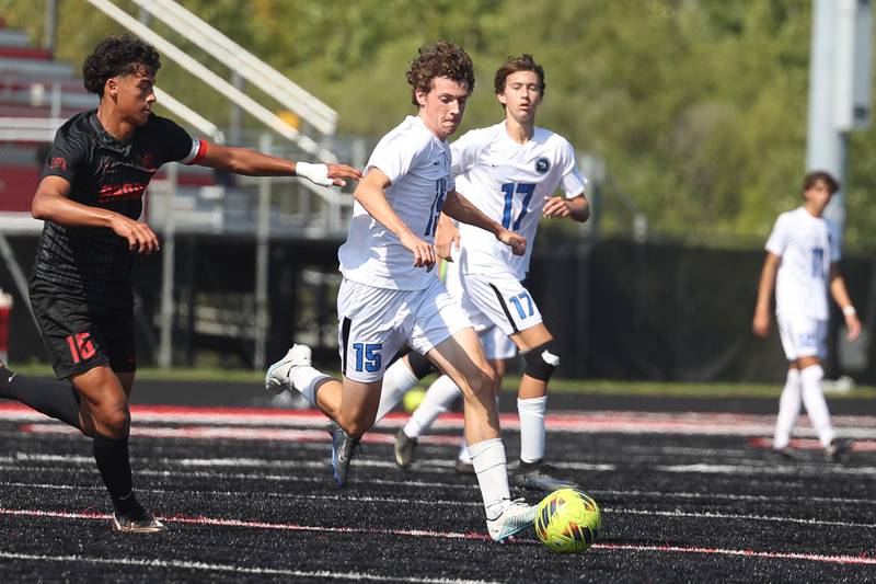 Lincoln-Way East’s Daniel McVeigh works the ball midfield against Bolingbrook on Saturday, Sept. 30, 2023 in Bolingbrook.