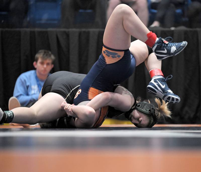 Sycamore’s Ema Durst pins Isabella Miller of Oak Park River Forest in the 140-pound class at the girls wrestling state finals tournament at Grossinger Arena in Bloomington on Saturday, Feb. 28, 2026.