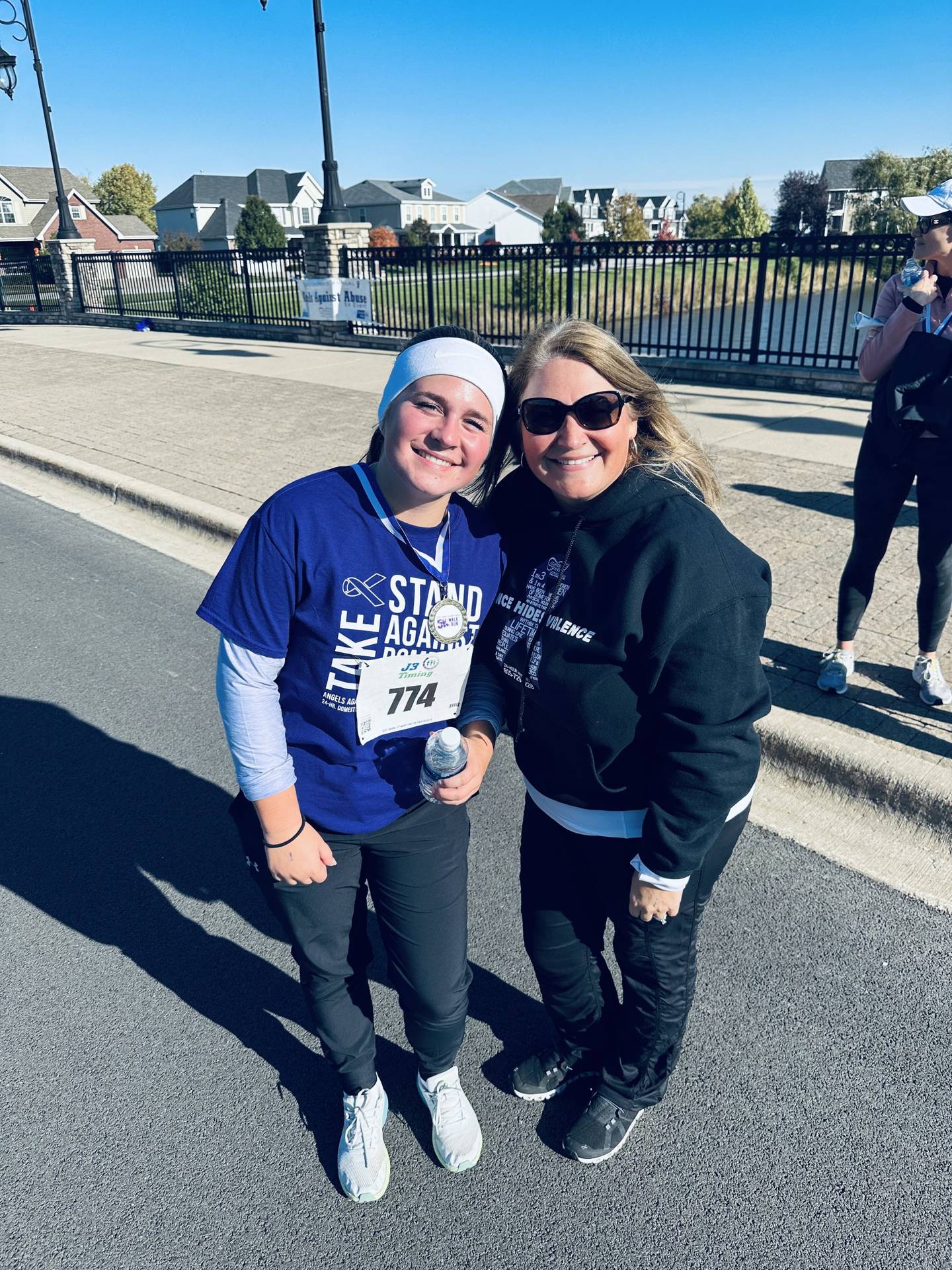 Guardian Angel Community Services recognized the 40th anniversary of its Groundwork domestic violence program during Guardian Angel’s 13th Annual Angels Against Abuse 5k on Oct. 21 at the Shorewood Towne Center. The first place winner at the 5K for ages 19 and under was Gretchen Ukleja (left), daughter of Guardian Angel Community Services Chief Development Officer Jane Ukleja (right).