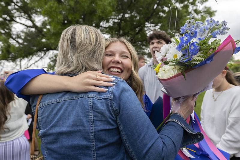 Macie Rosengren hugs mom Courtney on Wednesday, May 21, 2025, at the end of commencement at Newman High School.