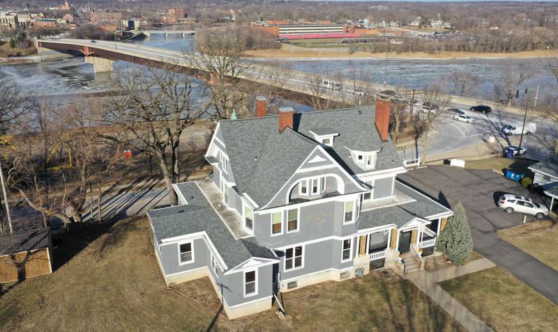 An exterior aerial view of the The Cora J. Pope Home located at 116 W. Prospect Ave., in Ottawa. The home is for sale fo the third time since it was built in 1902.  Milton and Cora Justine Pope built this 18-room Victorian home on the south bluff of Ottawa, overlooking the Illinois River,. Cora oversaw much of the construction work herself. The couple did not have children, but each had an abiding interest in the community.

When Cora died in 1942, the sixth item in her will bequeathed her home, together with all the household furniture, furnishings, goods and equipment, “to establish and perpetually maintain a home for the comfortable support and maintenance of aged, respectable, indigent women, who may be incapable of self-support, but not including any who may be paupers, the said home to be always known and named The Cora J. Pope Home.”