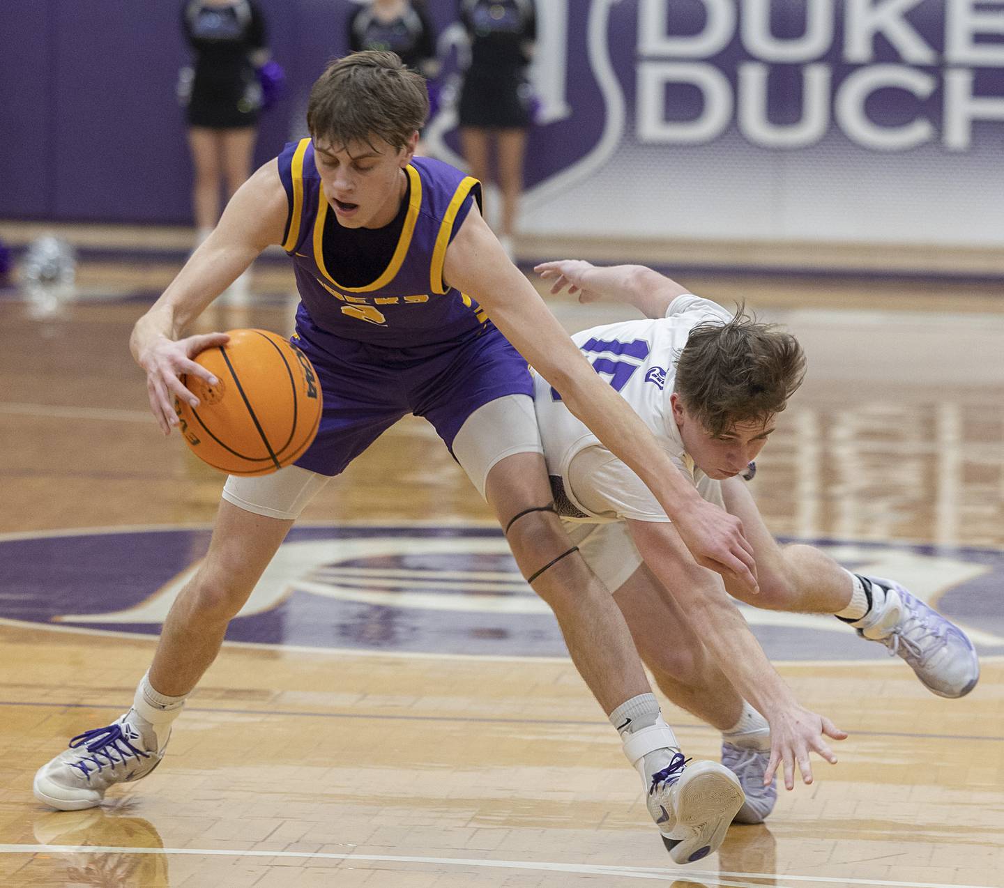 Dixon’s Jimi Gosinski goes for the steal against Sherrard’s Brylan Bender Friday, Feb. 20, 2026.