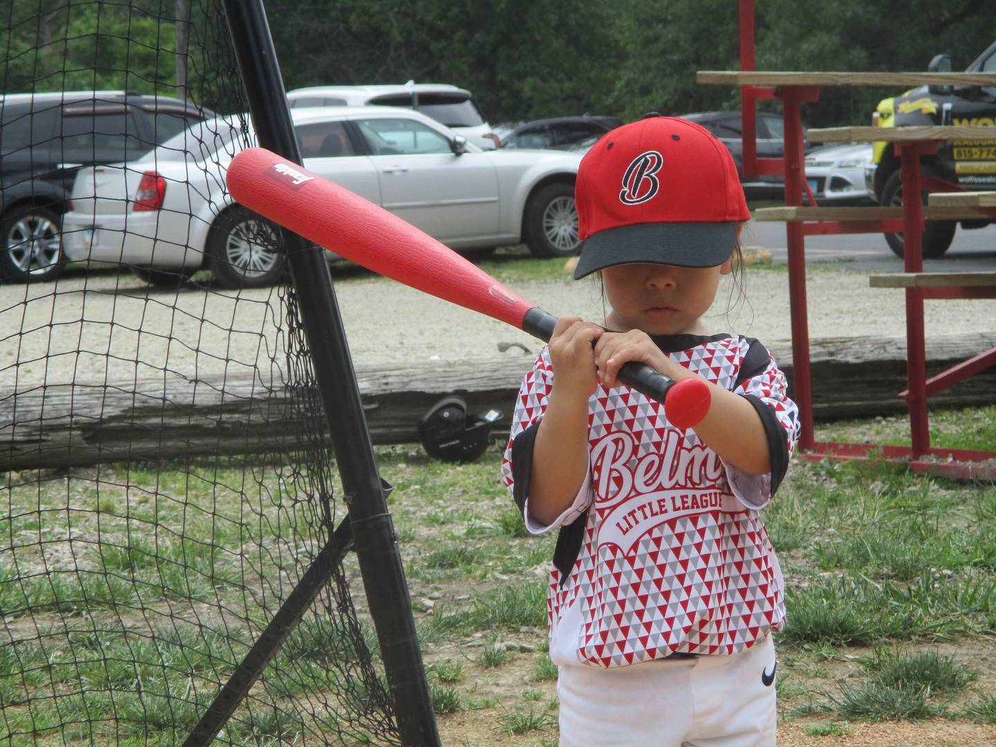 Belmont Little Leaguer Julian Mascote age 4, gets batting instruction at the league's T-ball field in Joliet. June 14, 2025