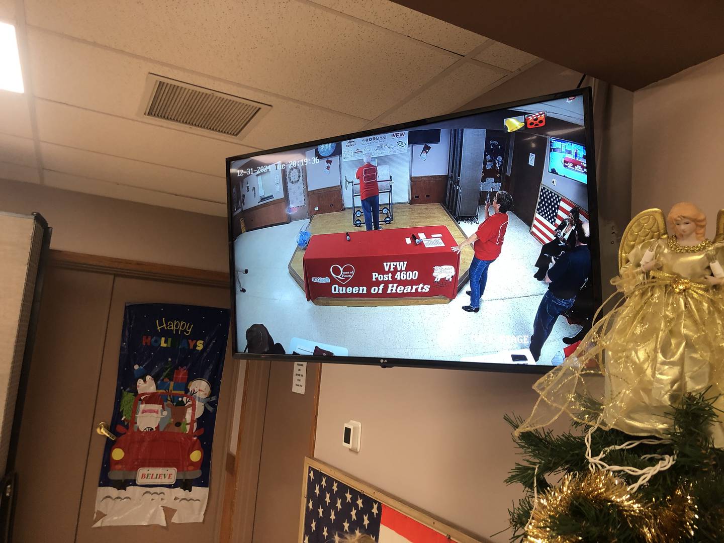 The TV screen shows the activity on Tuesday, Jan. 31, 2024, at the McHenry VFW Post 4600. The post closed out the year with a winner in its Queen of Hearts raffle. The winner took home half if the $2.5 million pot.