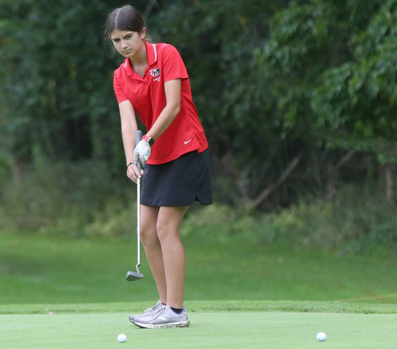 Erie-Phophetstown's Jaelin Hawkins puts toward the 8th hole during the Class 1A Regional golf meet on Thursday, Sept. 28, 2023 at Spring Creek Golf Course in Spring Valley.