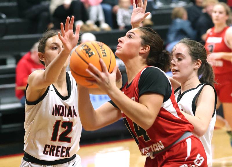 Aurora Christian’s Jada Yizkaya goes to the basket against Indian Creek's Isabella Turner during their game Monday, Nov. 25, 2024, at Indian Creek High School in Shabbona.