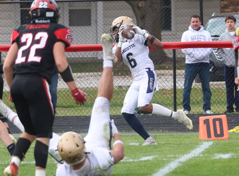 Marquette's Connor Baker makes a catch inside the 10 yard line during the Class 1A playoff game on Saturday, Nov. 1, 2025 at Gibson City-Melvin-Sibley High School.