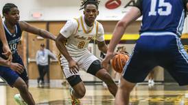 Photos: Joliet West Defeats Plainfield South Boys Basketball