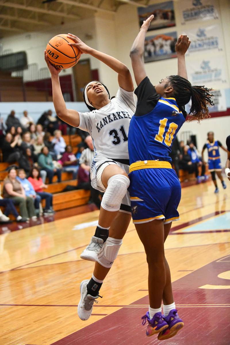 Kankakee's TaLeah Turner goes for a layup under pressure from a Crete-Monee defender on Thursday, Feb. 6, 2025, during the Kays' 49-15 victory over Crete-Monee.