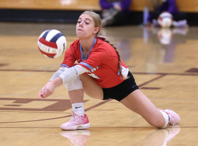 Ottawa's Kendall Biba receives a Dixon serve Tuesday, Oct. 28, 2025, during their Class 3A regional semifinal match at Rochelle High School.