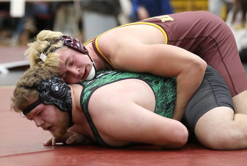 Richmond-Burton’s Breckin Campbell controls North Boone’s Christian Allen during a 285-pound match in the Tom DuBois Invite wrestling meet on Saturday, Dec. 13, 2025, at Richmond-Burton High School in Richmond.