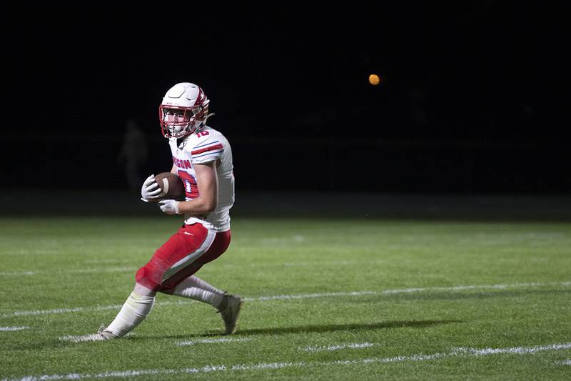 Oregon’s Keaton Salsbury pulls in an interception Friday, October 11, 2024, against Rock Falls.